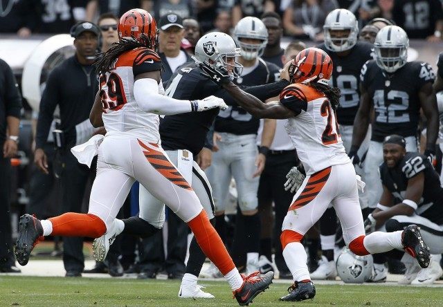 Derek Carr, Adam Jones