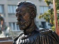Workers prepare the plinth (L), where the monument of the last Russian Emperor, Tsar Nicholas II, will be placed in Belgrade on October 13, 2014. According to local media reports, the monument will be unveiled later this year during a ceremony marking the WWI centenary and is a donation by the Russian Federation. On October 16, Russian President Vladimir Putin will visit and attend a military parade marking the 70th anniversary of Belgrade's liberation from fascist occupation.