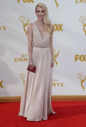 Emma Roberts, Evan Peters reunite at 'Scream Queens' premiere