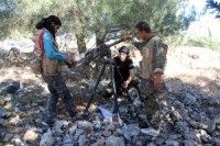 Rights group: 75 rebels trained by U.S.-led coalition enter Syria