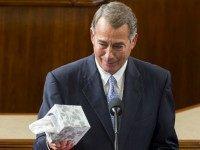 Outgoing Speaker of the House John Boehner, Republican of Ohio, holds up a box of tissues as he gives a farewell speech from the House floor at the US Capitol in Washington, DC, October 29, 2015. US Representative Paul Ryan, Republican of Wisconsin, is expected to become the new Speaker later today. AFP PHOTO / SAUL LOEB (Photo credit should read