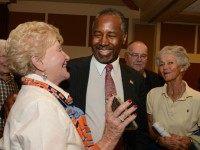 Republican presidential candidate Ben Carson speaks with supporters following a town hall event at River Woods September 30, 2015 in Exeter, New Hampshire. Carson has risen in the most recent polls to pull almost even with front runner Donald Trump. (Photo by