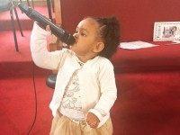Girl sings at Pleasant Grove Baptist Church (Facebook)