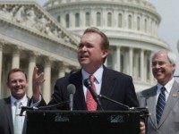 Rep. Mick Mulvaney (R-SC) (C) speaks during a news conference with a bipartisan group of House members, including Rep. Patrick Murphy (D-FL) (L) and Rep. John Barrow (R-GA), outside the U.S. Capitol May 20, 2014 in Washington, DC. Murphy and Mulvaney are co-sponsoring legislation 'aimed at modernizing America's regulatory system to reduce compliance costs, encourage growth and innovation, and improve national competitiveness.'