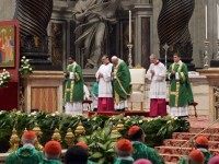Pope Francis (C) leads a mass for the opening of the synod on the family on October 4, 2015 at St Peter's basilica in Vatican. Pope Francis opened a gathering of bishops intended to review Catholic teaching on the family against a backdrop of controversy over homosexuality. The church's second synod on the family opened in a tense atmosphere the day after a senior priest announced he was gay and accused the Vatican of 'institutionalised homophobia'. AFP PHOTO / TIZIANA FABI
