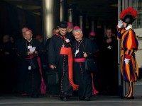 Bishops and cardinals leave at the end of the morning session of the Synod on the Family, at the Vatican on October 5, 2015. Pope Francis said on October 5 that the Church was 'not a museum' but a place for progress, as members of a key synod started three weeks of debate aimed at reshaping Catholic teaching on the family. Francis urged a spirit of 'solidarity, courage and humility' as the Catholic Church's conservative and liberal wings began tackling hot-button topics from communion for remarried divorcees to acceptance of homosexuality. AFP PHOTO / TIZIANA FABI (Photo credit should read