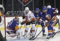 Mikael Backlund, Jaroslav Halak, Johnny Boychuk