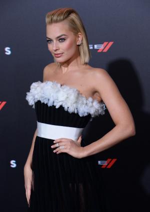 Margot Robbie covers Empire magazine as Harley Quinn