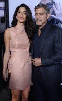 George and Amal Clooney adopt rescue dog