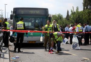 Six Israelis injured in stabbings; Palestinian killed