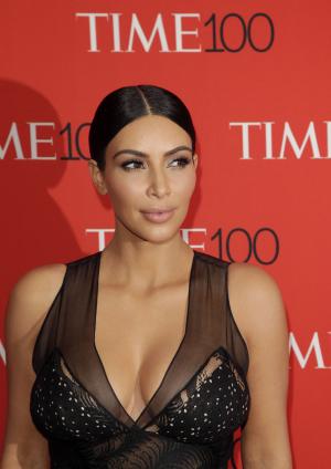 Kim Kardashian cancels baby shower, stays by sister Khloe, Lamar Odom's side