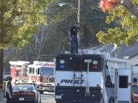 Burning SUV story (Jeff Gretchen / The Register / Associated Press)