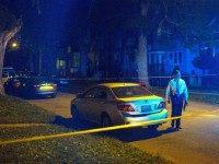Police officers investigate a shooting scene where 5 people were reported to have been shot, including an 11-month-old infant, on September 28, 2015 in Chicago, Illinois. Chicago, like many major cities in the United States, has experienced a surge in shootings this year. (Photo by