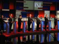 Presidential candidates Ohio Governor John Kasich (L-R) speaks while Jeb Bush, Sen. Marco Rubio (R-FL), Donald Trump, Ben Carson, Ted Cruz (R-TX), Carly Fiorina, and Sen. Rand Paul (R-KY) take part in the Republican Presidential Debate sponsored by Fox Business and the Wall Street Journal at the Milwaukee Theatre November 10, 2015 in Milwaukee, Wisconsin. The fourth Republican debate is held in two parts, one main debate for the top eight candidates, and another for four other candidates lower in the current polls. (Photo by