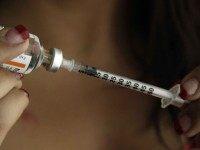 Diabetes insulin injection (Reed Saxon / Associated Press)