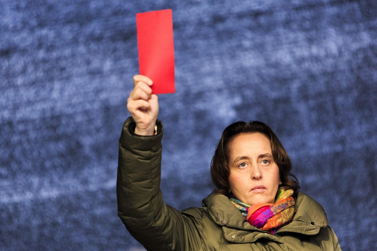 Beatrix von Storch, member of the European Parliament, gives Merkel the red card (Carsten Koall/Getty Images)
