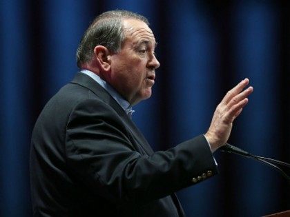 Republican presidential candidate former Arkansas Governor Mike Huckabee speaks during the Sunshine Summit conference being held at the Rosen Shingle Creek on November 13, 2015 in Orlando, Florida. The summit brought Republican presidential candidates in front of the Republican voters. (Photo by)