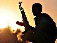 Kurdish soldier guards checkpoint AFPDelil Souleiman