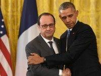 Barack Obama(R) and his French counterpart Francois Hollande hold a press conference at the White House in Washington, DC, on November 24, 2015. AFP PHOTO/NICHOLAS KAMM / AFP / NICHOLAS KAMM (Photo credit should read