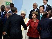 President Barak Obama shakes hands with President of Brasil Dilma Roussef during the family photo session of the Cop 21 on November 30, 2015 in Paris, France. World leaders are meeting in Paris for the start of COP21, the two-week UN climate change summit, attempting to agree on an international deal to curb greenhouse gas emissions. (Photo by )