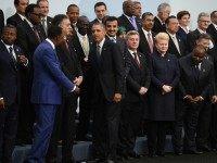 Barack Obama (5thL) is greeted by world leaders as he arrives for the family photo at the COP21, United Nations Climate Change Conference, in Le Bourget, outside Paris, on November 30, 2015. More than 150 world leaders are meeting under heightened security, for the 21st Session of the Conference of the Parties to the United Nations Framework Convention on Climate Change (COP21/CMP11), also known as 'Paris 2015' from November 30 to December 11. AFP PHOTO / POOL / MARTIN BUREAU / AFP / POOL / MARTIN BUREAU (Photo credit should read