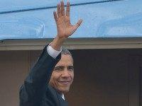 Barack Obama waves as he boards Air Force One for his departure at the Royal Malaysian Airforce base in Subang, outside Kuala Lumpur on November 22, 2015, after attending the 27th Association of South East Asian Nations (ASEAN) Summit.
