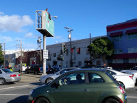 Naked man on I-80 freeway sign (Roy Munin / Twitter)