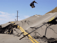 Skateboarding buckled road (Garrett Hill / Twitter)