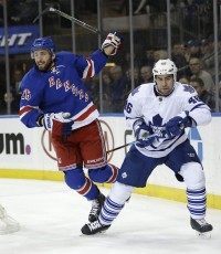 J.T. Miller, Roman Polak