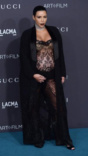 Kim Kardashian wears bold, black-lace jumpsuit to LACMA gala
