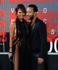 Chrissy Teigen shows off baby bump in new photo