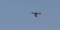 Woman forced to pay damages after throwing rocks at neighbor's drone