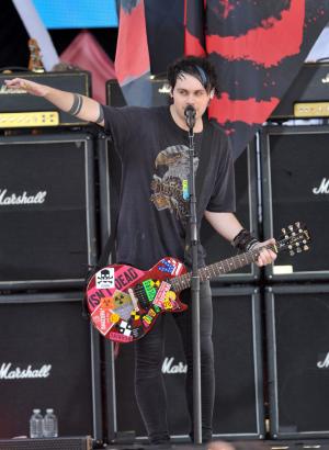 Michael Clifford, 5 Seconds of Summer singer, falls during Radio 1 performance