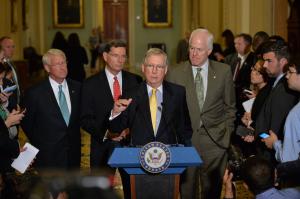 Senate passes defense bill with new restrictions on Guantanamo transfers