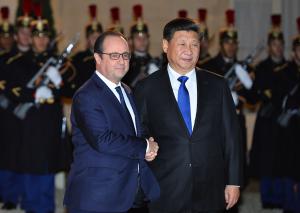 World leaders meet in Paris for climate talks as police clash with protesters