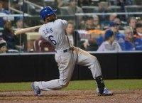 Kansas City Royals' Lorenzo Cain behind free Taco Bell breakfast