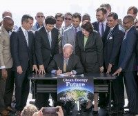 Jerry Brown climate bill (Damian Dovarganes / Associated Press)