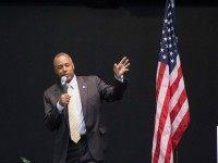 : Republican presidential candidate Ben Carson speaks to guests at a barbeque hosted by Jeff Kauffman, chairman of the Republican party of Iowa, on November 22, 2015 in Wilton, Iowa. The event, which was also attended by rival candidate Carly Fiorina, was one of three scheduled campaign stops for Carson in Iowa.
