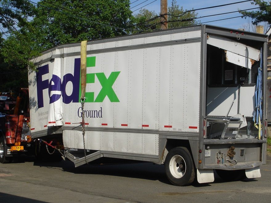Naked Man Allegedly Tries To Carjack A FedEx Truck, But 