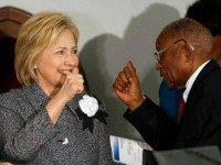 Democratic presidential candidate Hillary Clinton greets and gives a thumbs-up to Fred Gray, Rosa Parks former attorney, before speaking at the Dexter Avenue King Memorial Baptist Church, Tuesday, Dec. 1, 2015, in Montgomery, Ala. Mrs. Clinton's keynote address is part of a two-day event put on by the National Bar Association in recognition of the 60th anniversary of the Montgomery city bus boycott witch began after Rosa Parks refused to give up her seat to a white man.