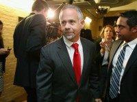 Rep. Tim Huelskamp (R-KS) (C) leaves a House Republican caucus meeting in the U.S. Capitol October 21, 2015 in Washington, DC. A member of the far-right House Freedom Caucus, Huelskamp said that House Ways and Means Committee Chairman Paul Ryan is asking for 'more power and less responsibility' in his pursuit of the speakership. (Photo by C