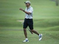 Obama arrives on the 18th hole of the Mid-Pacific Country Club's golf course December 21, 2015 in Kailua, Hawaii. Obama and the First Family are in Hawaii for vacation. AFP PHOTO/BRENDAN SMIALOWSKI / AFP / BRENDAN SMIALOWSKI (Photo credit should read )