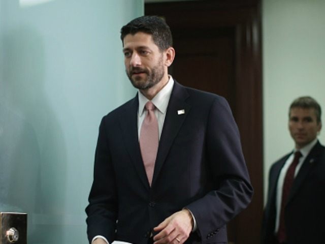 Speaker of the House Paul Ryan (C) arrives for a news conference following the weekly House GOP Conference meeting at the U.S. Capitol December 16, 2015 in Washington, DC. Ryan announced that House Republicans have reached a deal with leaders in the House and Senate on an omnibus federal budget bill that would fund the government until September of 2016. (Photo by