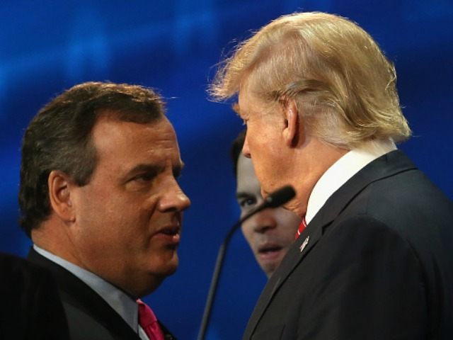 Presidential candidates Donald Trump (R) speaks with New Jersey Gov. Chris Christie during a break at the the CNBC Republican Presidential Debate at University of Colorados Coors Events Center October 28, 2015 in Boulder, Colorado. Fourteen Republican presidential candidates are participating in the third set of Republican presidential debates. (Photo by )