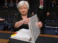 Federal Reserve Janet Yellen prepares to testify before a Joint Economic Committee hearing on 'The Economic Outlook,' on Capitol Hill in Washington, DC, on December 3, 2015. AFP / NICHOLAS KAMM