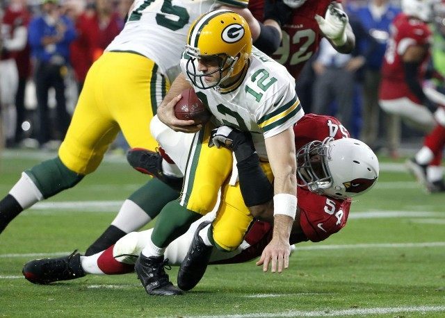Aaron Rodgers , Dwight Freeney