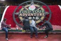 Rose Parade float decorators add finishing touches