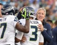 Pete Carroll climbs lockers after Seattle Seahawks win