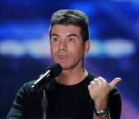 Simon Cowell robbed while at home with his family