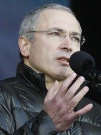 Former oil tycoon, Russia's richest man charged with organizing three murders